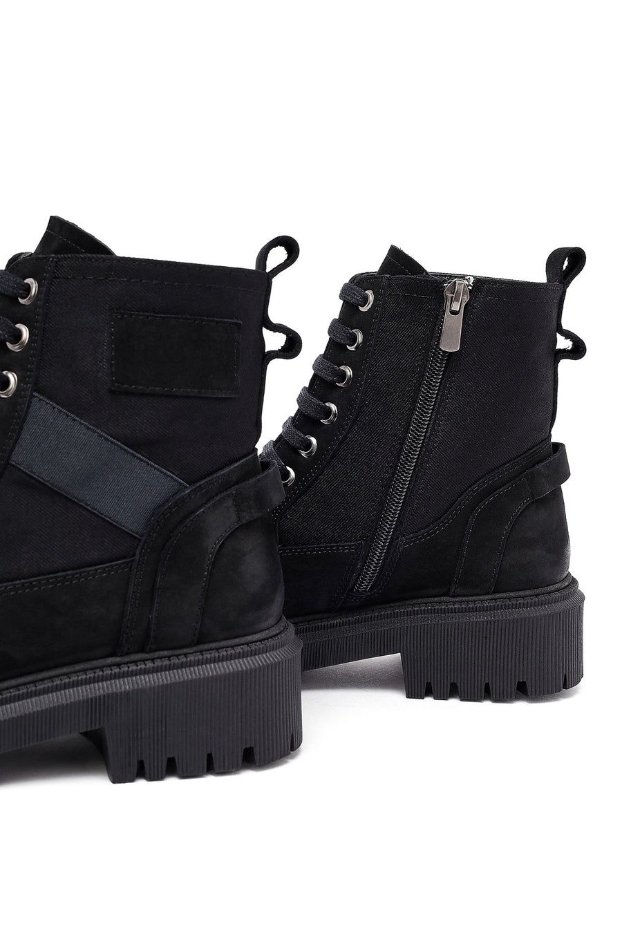 Woman Black Zippered Leather Postal Boots