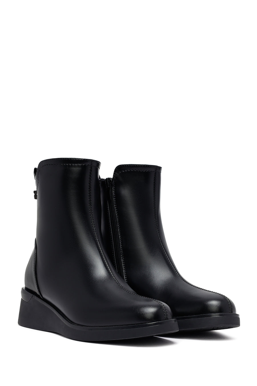 Woman Black Zippered Wedge Heeled Boots